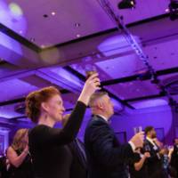 Guests toasting President Haas at Enrichment.